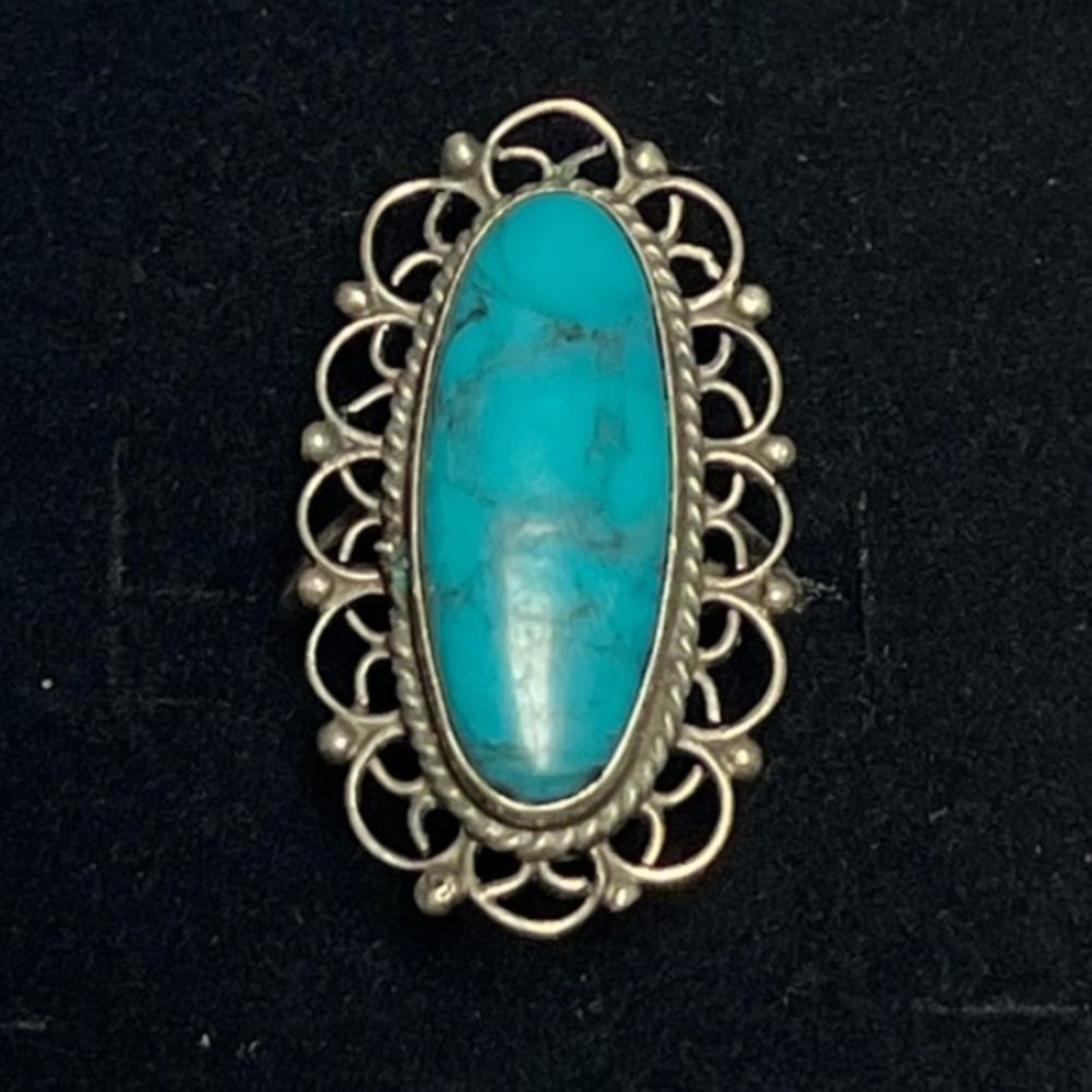 sterling silver oval filigree ring. Blue stone. Feminine. Bold. Unique.